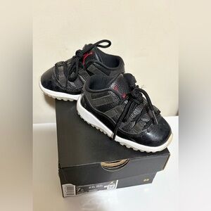 Black and White Jordan 11 Sneakers with Patent Leather